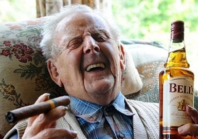 Man-Drinking-Whiskey-and-Smoking