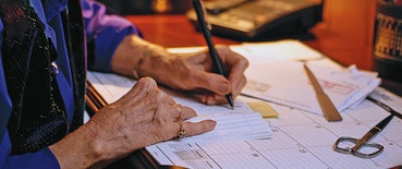 senior signing papers