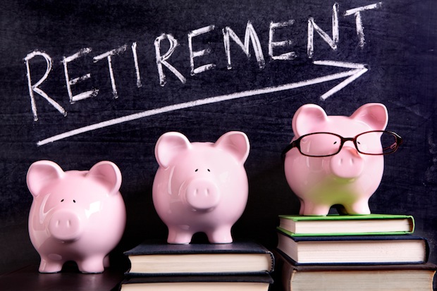Three piggy banks with retirement savings message