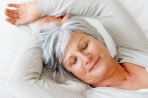 View of a retired senior woman sleeping in bed