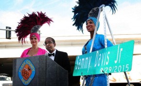 This photo provided by Erik Pappa, Clark County communication director, shows Manny Davis son of Sammy Davis Jr. talks during a dedication ceremony to rename a street in his father's name in Las Vegas, Tuesday, Sept. 29, 2015. The ceremony was held at the three-way intersection where Sammy Davis Jr. Drive, Frank Sinatra Drive and Dean Martin Drive meet. (Erik Pappa/Clark County, Nevada via AP)